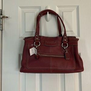 NWT - mauve colored Coach Penelope’s Satchel.